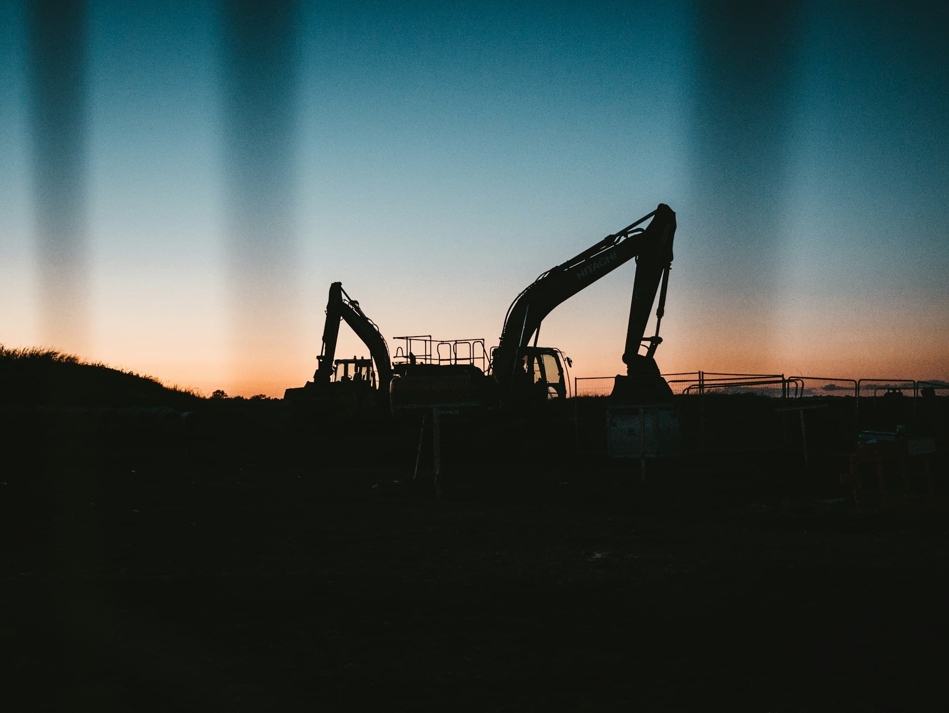 Heavy equipment silhouette at dusk
